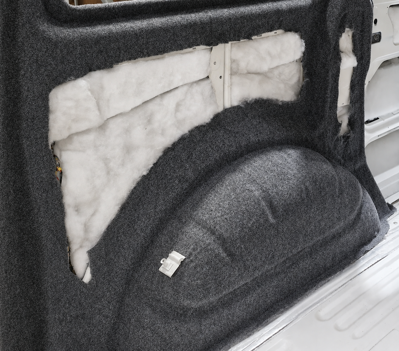 VW Transporter interior lined in grey 4-way stretch carpet